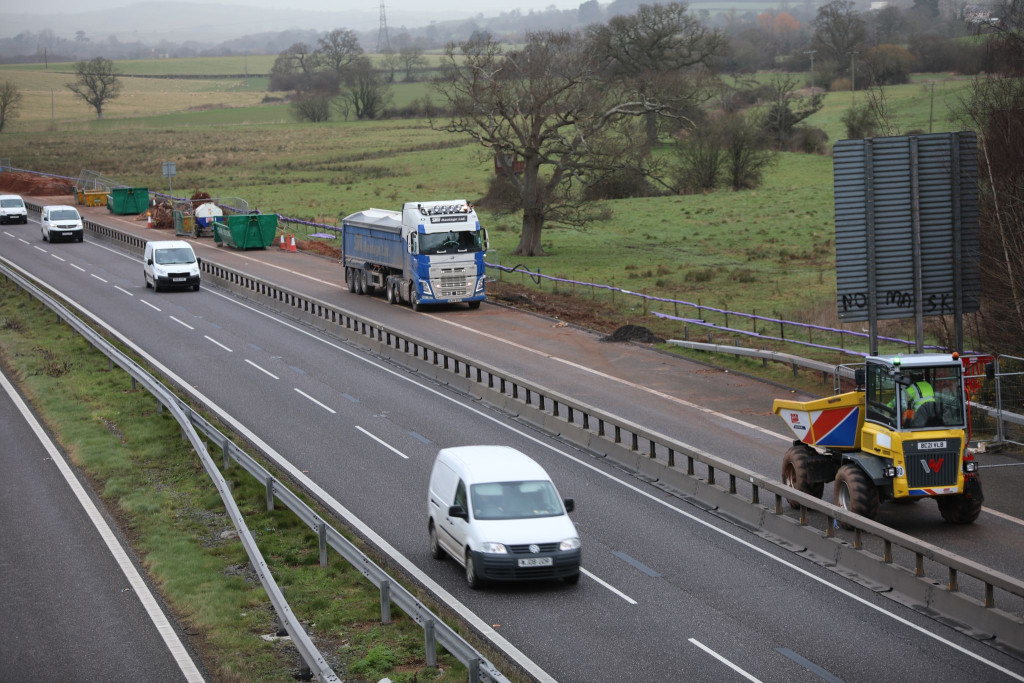 M5 Exeter Road Safety Barriers installed with traffic driving by