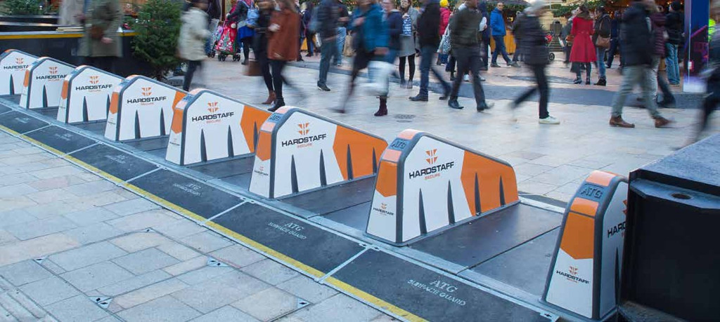 Hostile vehicle mitigation Surface Guard installed at the Birmingham Christmas market with people walking past