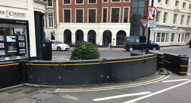 curved barrier for HVM