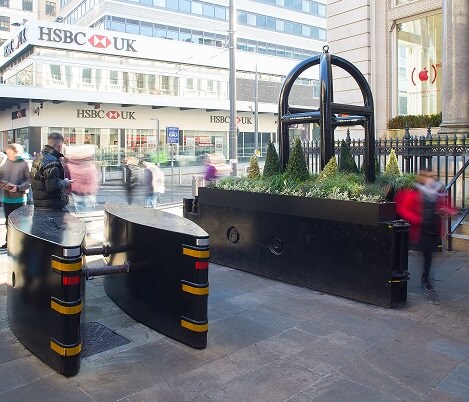 HVM barges next to a pedestrian portal in busy town centre