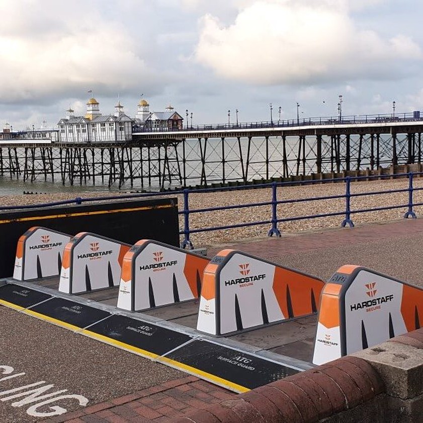 Photograph of Hostile Vehicle Mitigation from Hardstaff Barriers installed along a path at Eastbourne Air Show 2019 with Eastbourne Pier in the background