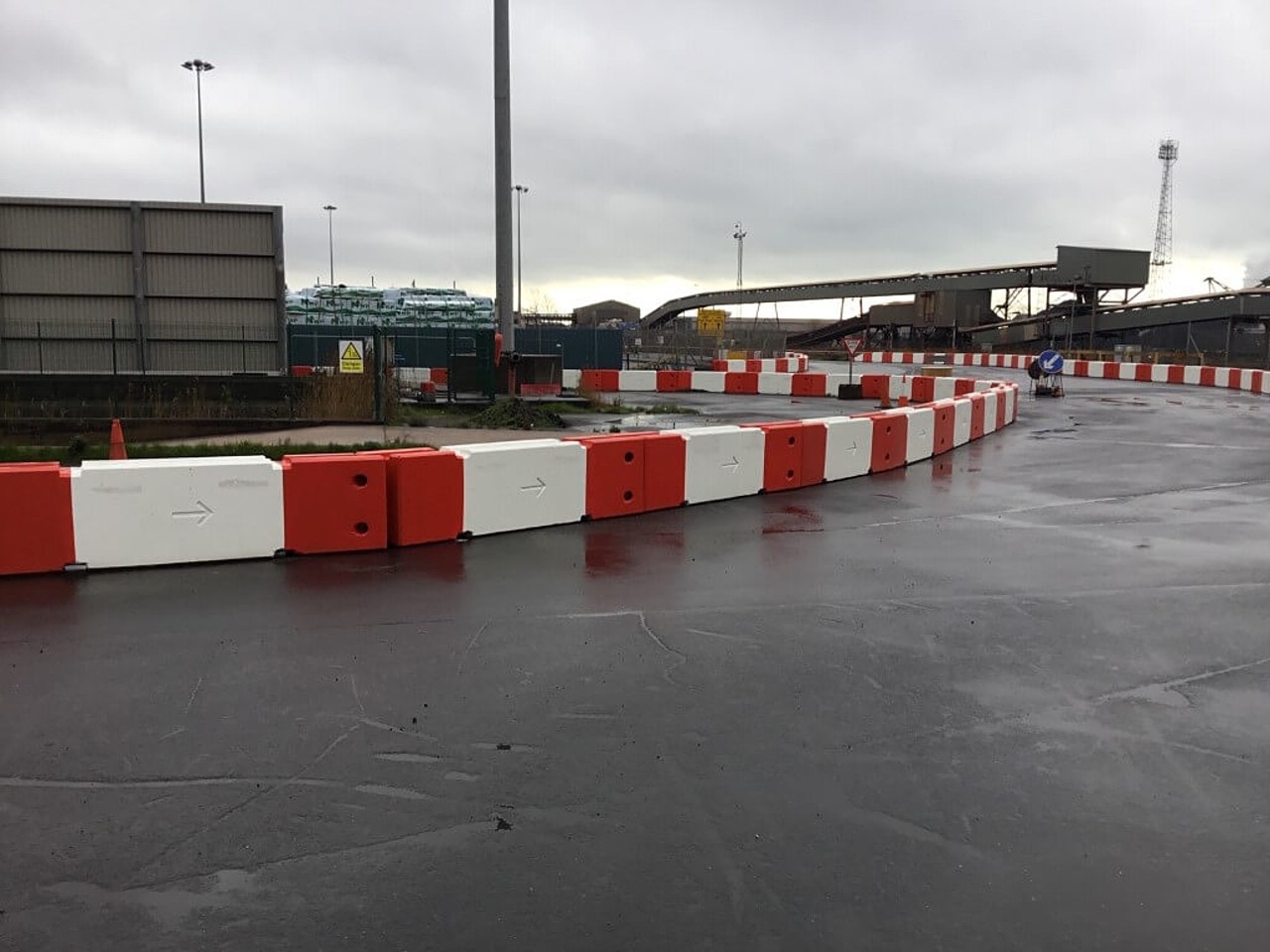Photo of red and white road barrier at an airport